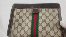 Load and play video in Gallery viewer, Gucci Clutch GG Canvas PVC Brown - 01438