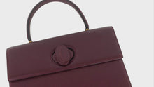 Load and play video in Gallery viewer, CARTIER HANDBAG BRD PLAIN TURNLOCK MASTLINE GOLD HARDWARE - 01483