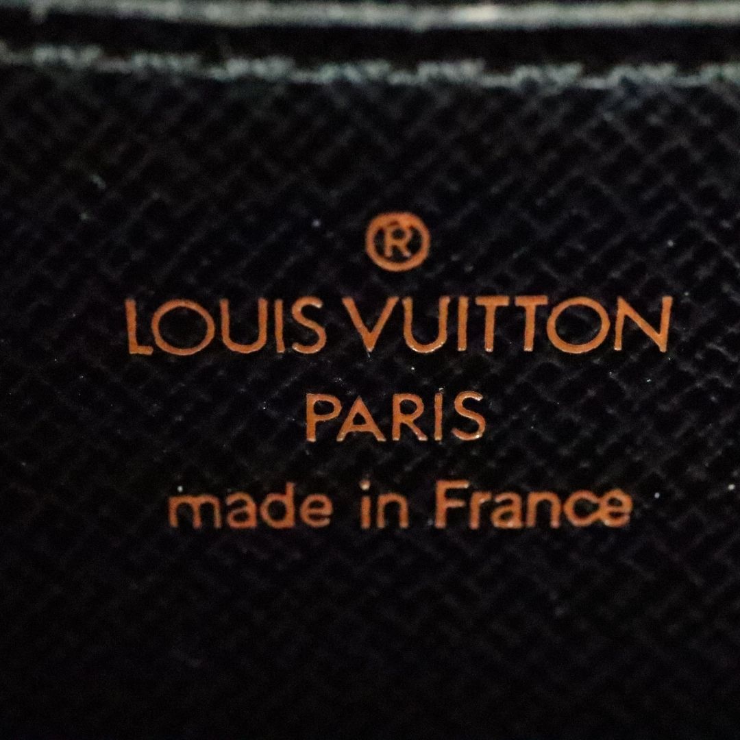 Louis Vuitton Grenelle (discontinued) Compact Wallet Reference M